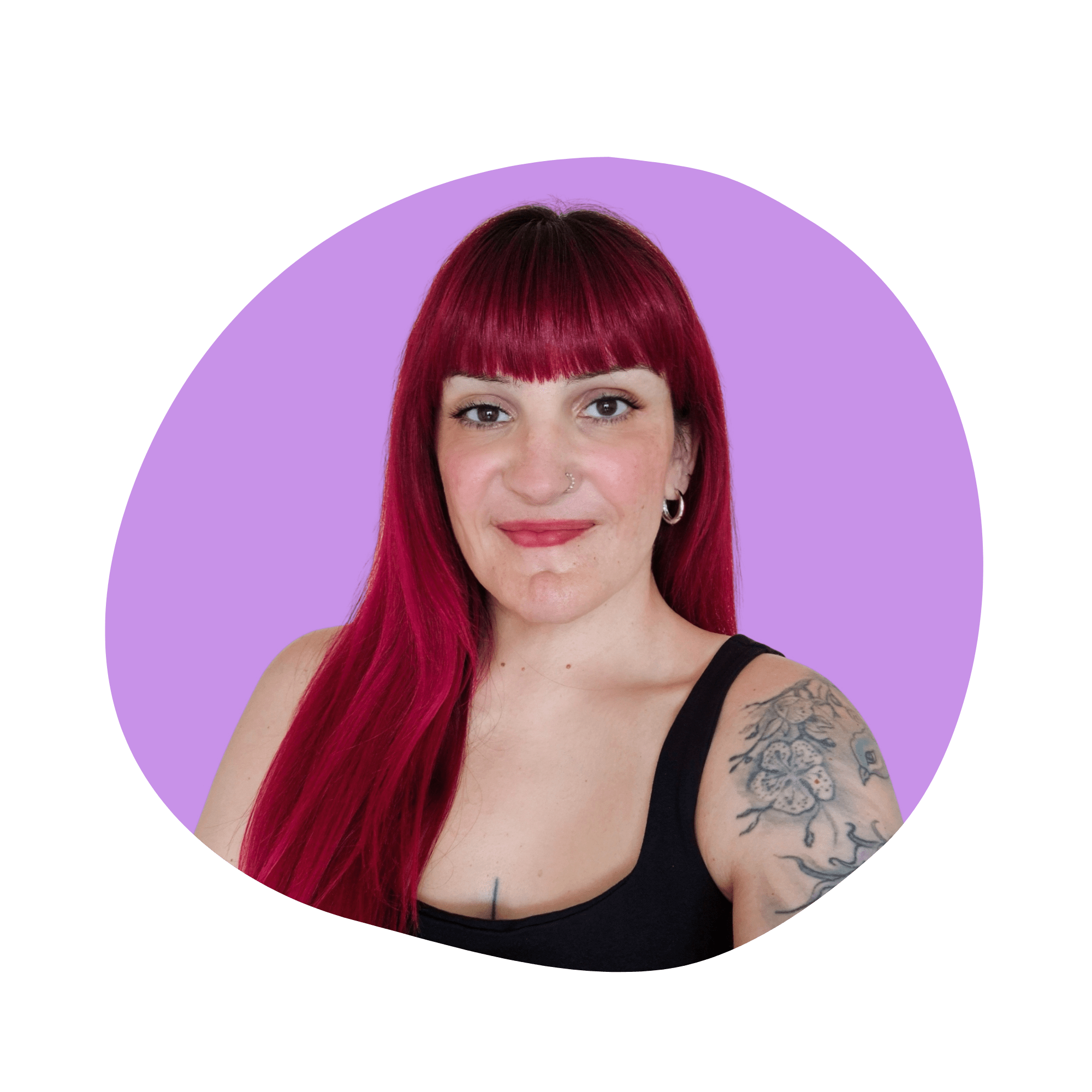 Savvina Drougouti, founder and headhunter at talents lab, smiling confidently with long red hair, wearing a black top and showcasing a floral tattoo on her arm, against a purple background.